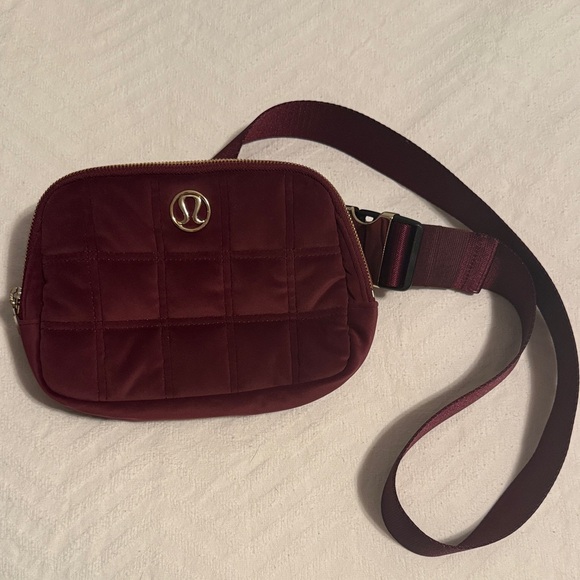 lululemon athletica Handbags - lululemon athletica Velour Quilted Wine Crossbody Belt Bag with Gold Logo